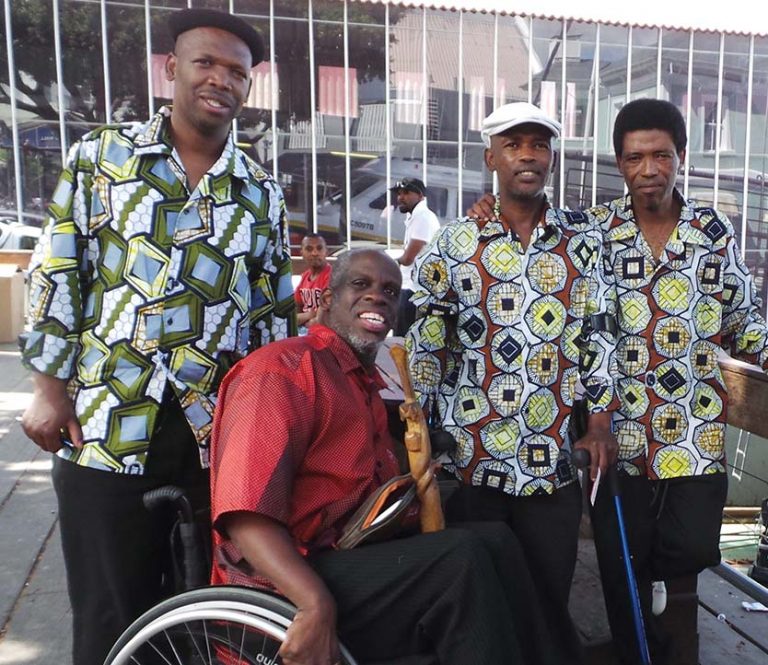 Leroy-Moore-with-the-Qhumza-brothers-from-Khayelitsha-United-Mambazo-Choir-in-Cape-Town