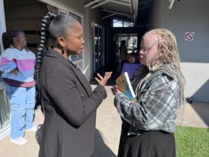 IMG_0418 Lallie Kibido chats to facilitator Mapalo Makhu after the financial literacy training