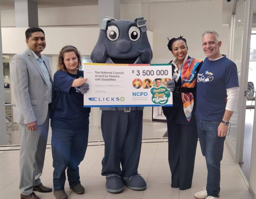 From left: Dhevan Pillay, Clicks Head of Store and Pharmacy Ops (SA); Adri Visser, Casual Day Coordinator; Abel, Casual Day Mascot; Bongiwe Ntuli, Clicks Managing Executive; and Louis Botha, Casual Day Manager. PHOTO: CHANDRE FORTUIN