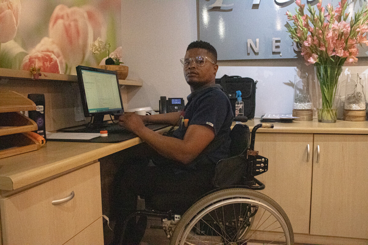 Tebogo at his workplace. His residency at the Jean Webber Home at Free State provides accessibility assistance