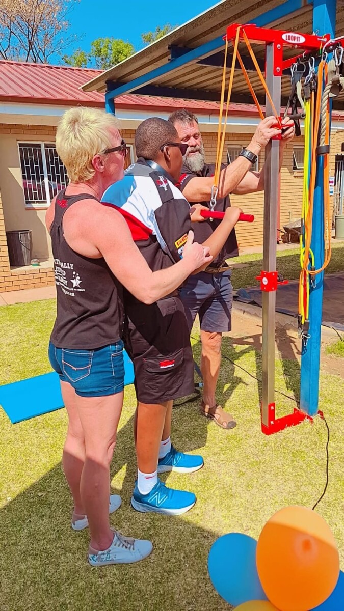 At the back is Mrs. Michelle Fraser, in the middle is Nkazimulo Mngomezulu and in front is Mr. Johan Van Der Schyf during the event at Curamus School