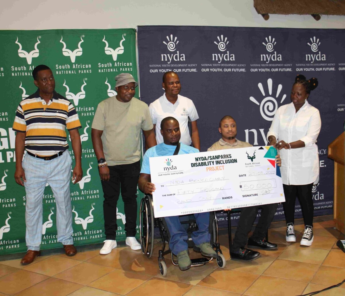 Gudani Ndou (in blue shirt) from Vhembe District - Venda was one of the 14 young entrepreneur beneficiaries who received the R50 000 grant stream. With him are (Clockwise) Kruger National Park’s Senior Manager – Human Capital Management - Simon Marutha, SANParks Senior Manager: Stakeholder Engagement, Capacity building and Youth development – Happy Nhlangwini, NYDA’s Alpheus Mosoma, NYDA Board Member – Sibusiso Makhathini and Kruger National Park’s Economic Transformation Officer – Portia Sambo.