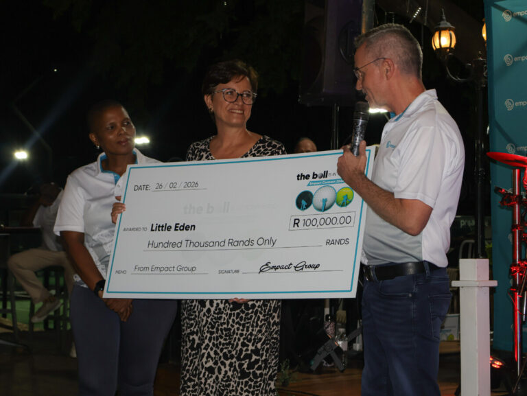 CEO of Little Eden Society, Ms Ann Coetzee, receiving a cheque from Empact Group CEO, Alan Quinn and Sanele Mlambo, Empact Group's Marketing & Communications Executive