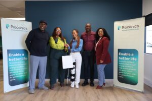 Tributes Excellence Awards winner Kamogele and Proconics staff