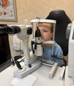 A child undergoes a digital eye-tracking assessment