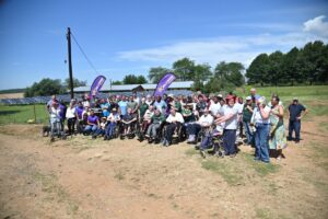 Pevensey Place residents celebrate their new solar power installation, funded by the Hollywood Foundation.
