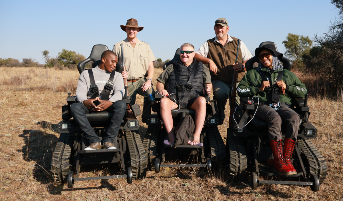 From left(on Track Explorers): Thiomas Ngwan, Normie Eckard and Luthando Kekana. Standing guides: Remco van Aalist(left) and Japie Bradley at Dinokeng Game Reserve